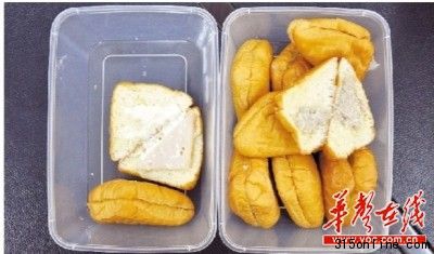 在8月8日泰國至長沙的航班上,旅客吃過后有不良反應的面包,面包盒上有多個標簽,而且面包中的夾心部分看上去很不新鮮。傅聰 攝 在8月8日泰國至長沙的航班上,旅客吃過后有不良反應的面包,面包盒上有多個標簽,而且面包中的夾心部分看上去很不新鮮。傅聰 攝